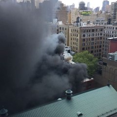 Smoke Billows from Six-Story Building on New York's Upper East Side