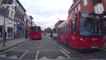 Woman trying to catch a bus narrowly avoids being run over by car