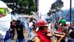 Demonstrator plays the violin amid riots in Caracas, Venezuela