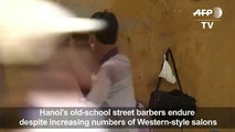 A cut above_ Hanoi's deft sidewalkers