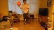 Man on Unicycle Spins Basketball While Simultaneously Solving Rubik's Cube