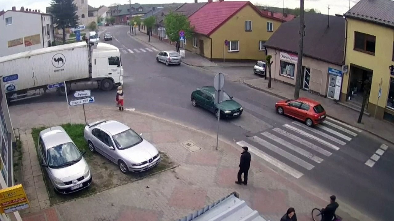 Elderly woman gets hit by truck and walks away