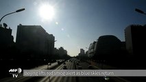 Beijing lifts smog red alert as blue skies return]
