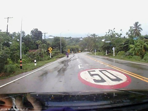 Truck Slides on Sharp Curve Hitting Motorcyclist