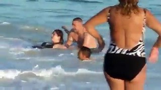 Fat Women Struggling In Beach