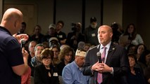 GOP lawmaker faces angry crowd at town hall