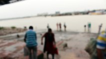 Many people came to the river ganga to shrink their body into the river