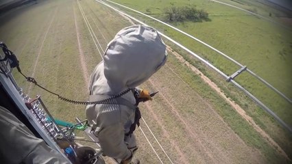 Helicopter Lineman - BareHanding 345,000 volts