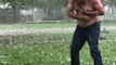 Crazy topless man braves Oklahoma hailstorm