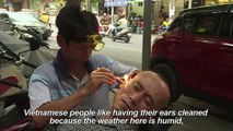 A cut above_ Hanoi's deft sidewalk barber