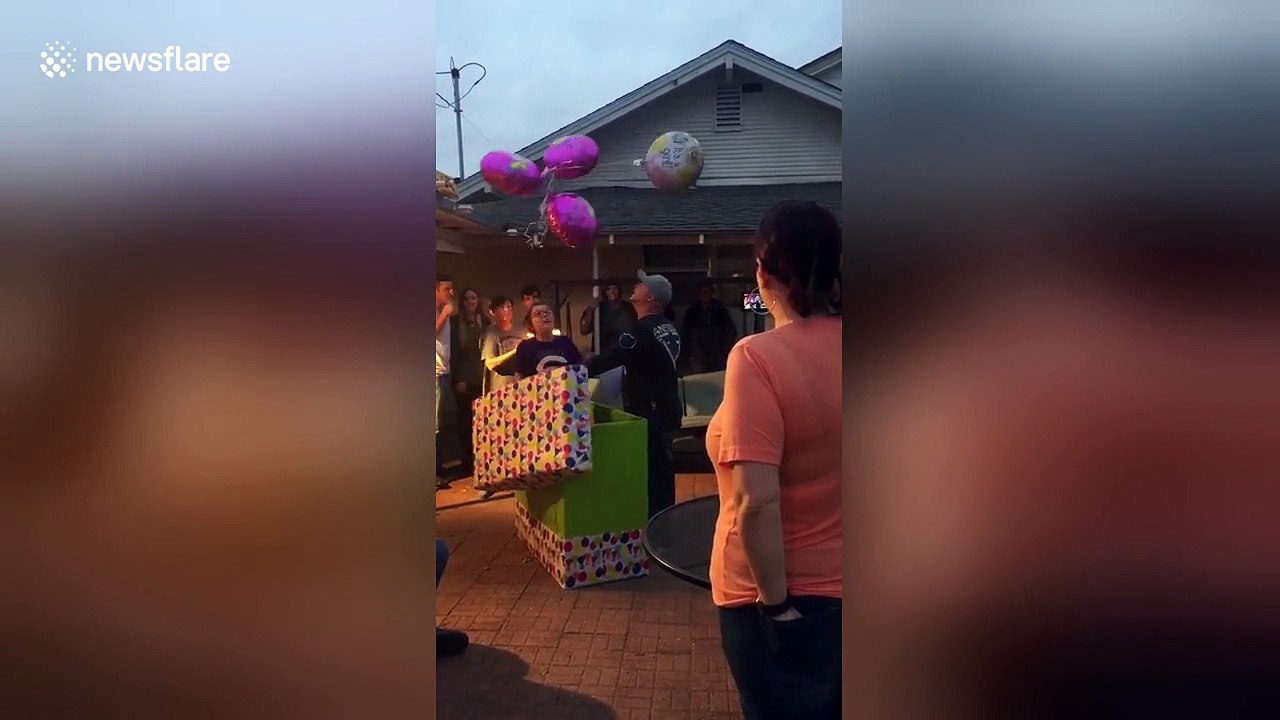 Daughter surprises stepdad with official adoption papers