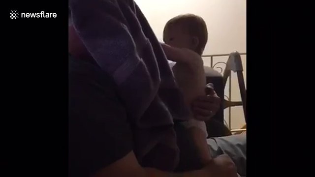 Baby's hilarious reaction to dad shaving beard