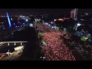 Evening Vigils for Jailed Jakarta Governor Light Up Roads Across Indonesia