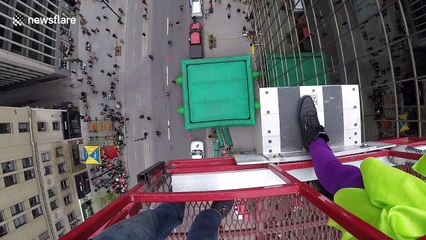Man jumps from 110-foot cherry picker for charity