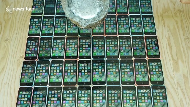 Pouring molten aluminum on 50 iPhones