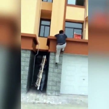 NTD Television - Prankster has fun with his mate's ladder...