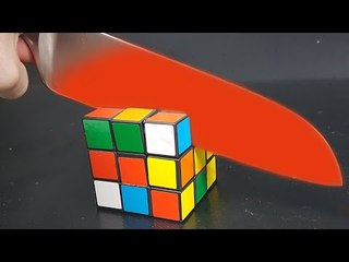 EXPERIMENT Glowing 1000 degree KNIFE vs RUBIK'S CUBE