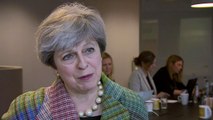May promises 'enhancement' of workers' rights