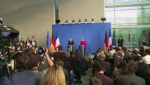 Merkel e Macron dispostos a mudar tratados se necessário