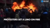 D.C. protesters set limo ablaze near inaugural parade-HnCXp_TOIbE