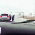 Crazy Road Rager Jumps On Woman's Car and Goes Nuts