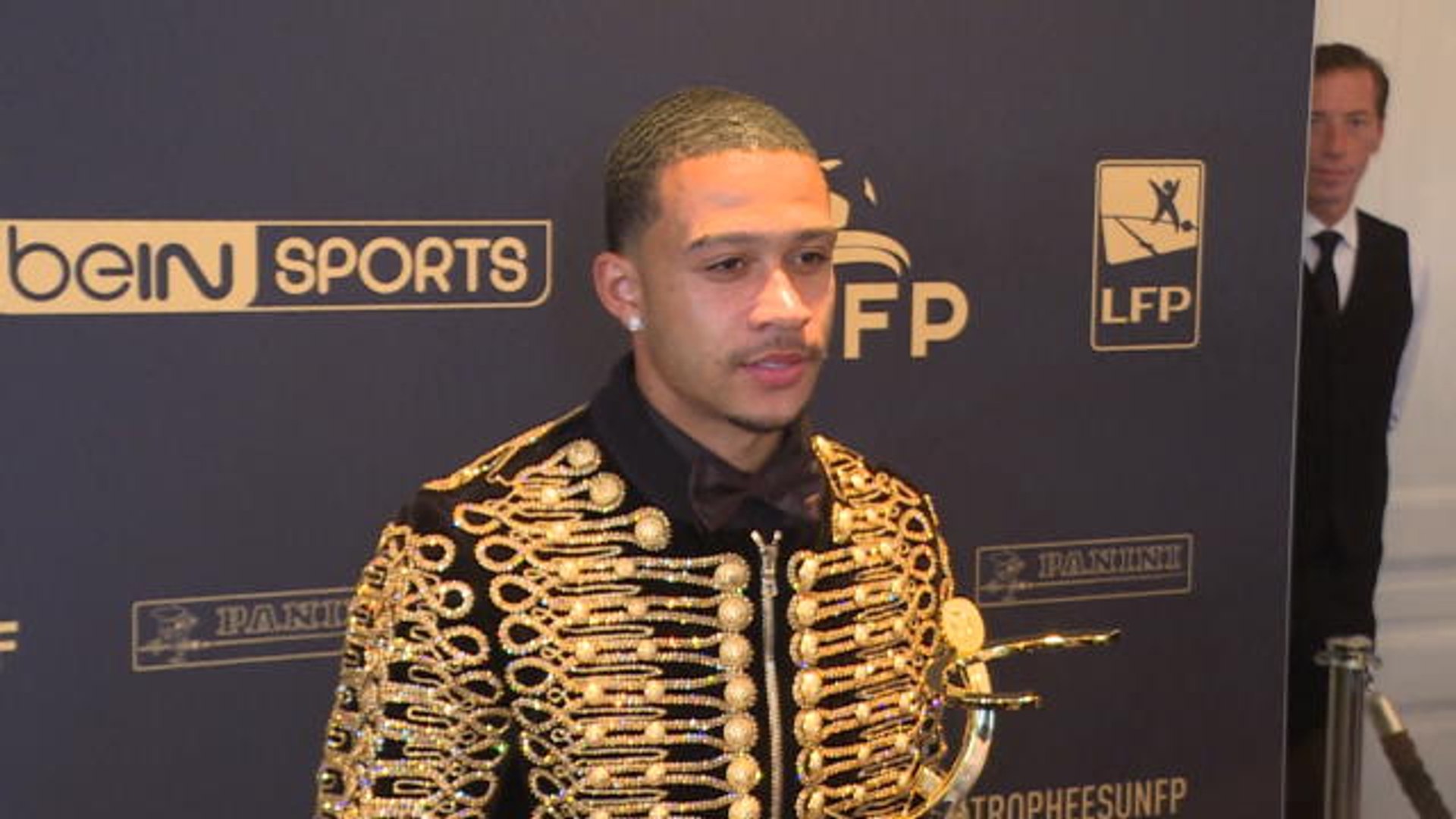 Memphis Depay dons garish attire at French football awards