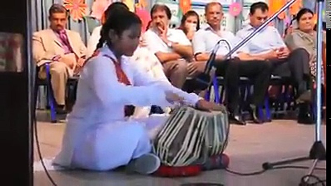 Talented Pakistani Christian girl playing tabla at CJM School Sialkot