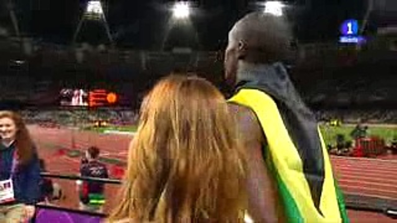 Usain Bolt stopped the interview to hear the U.S. anthem