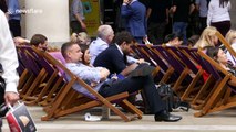 Londoners enjoy some lunchtime sun, at last