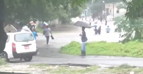 Flooding Turns Road in St Catherine Parish Into a River