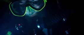 2 frogwomen diving in caves with hot wetsuits…. and some monsters