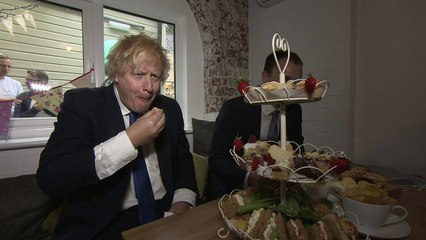 Boris devours cakes and moos 'like a cow' on bakery visit