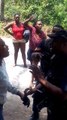 Jamaican Police Man Handle a Woman 