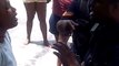 Jamaican Police Man Handle a Woman 