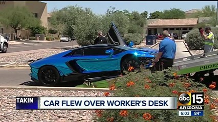 Pricey car crashes into Scottsdale building