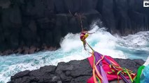 Daredevils Slackline Above Rocky Waters