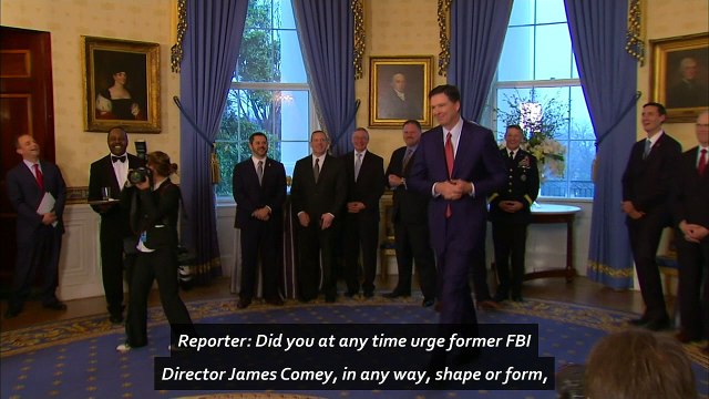 Trump denies urging Comey to drop Flynn probe