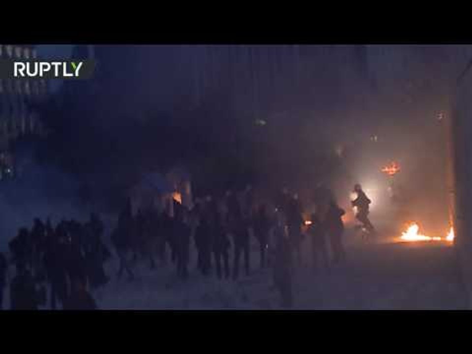 Molotov Cocktails & Tear Gas: Anti-Austerity protesters clash with police in Athens