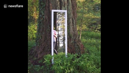 Man walks through mirror in amazing optical illusion