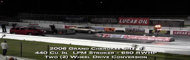 Fastest NA SRT 8 Jeep Cherokee vs Big Block Camaro - Wheelstand - Drag Race Video -- Road Test TV