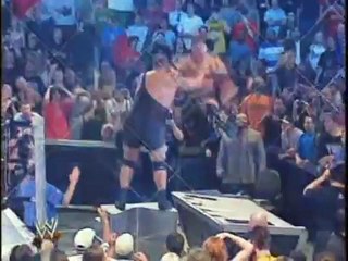 Big Show Chokeslams Brock Lesnar Through Announce Table