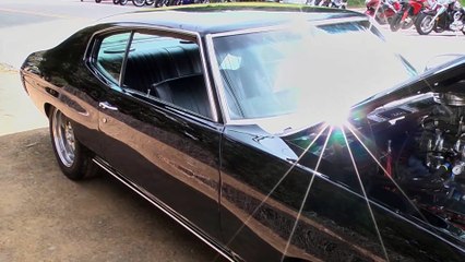 Chevrolet Chevelle with a blown 572 on the road