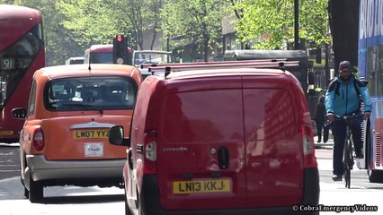 Heavy armored 'SWAT' police truck responding with siren and lights
