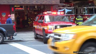 Fire truck responding and returning - FDNY Battalion 9 using a bit of siren