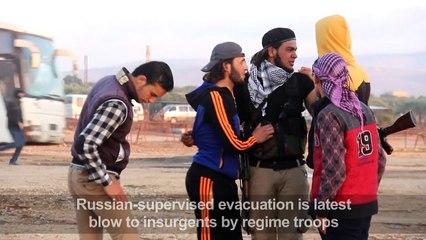 Rebels evacuated from Syria's Homs arrive in Idlib