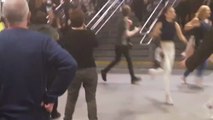 People run through Manchester's Victoria Station following explosions