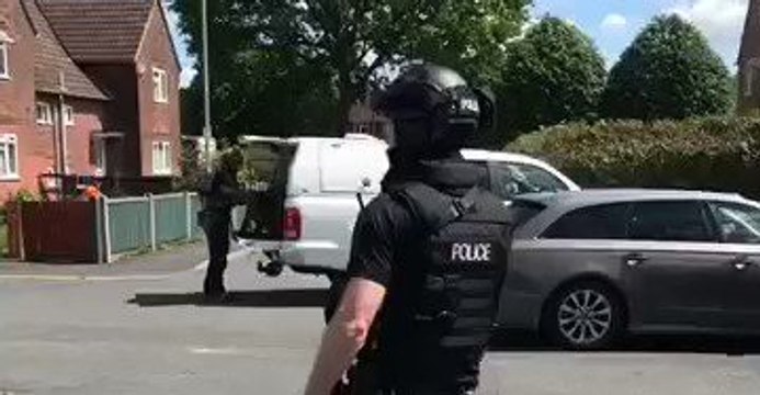 'Loud Bang' Reported, Armed Police Seen in South Manchester Residential Area