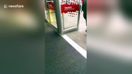 Armed police officers evacuate Manchester's Arndale shopping centre