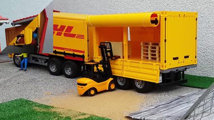 BRUDER toys DHL truck and forklift work-oYCb5ux0