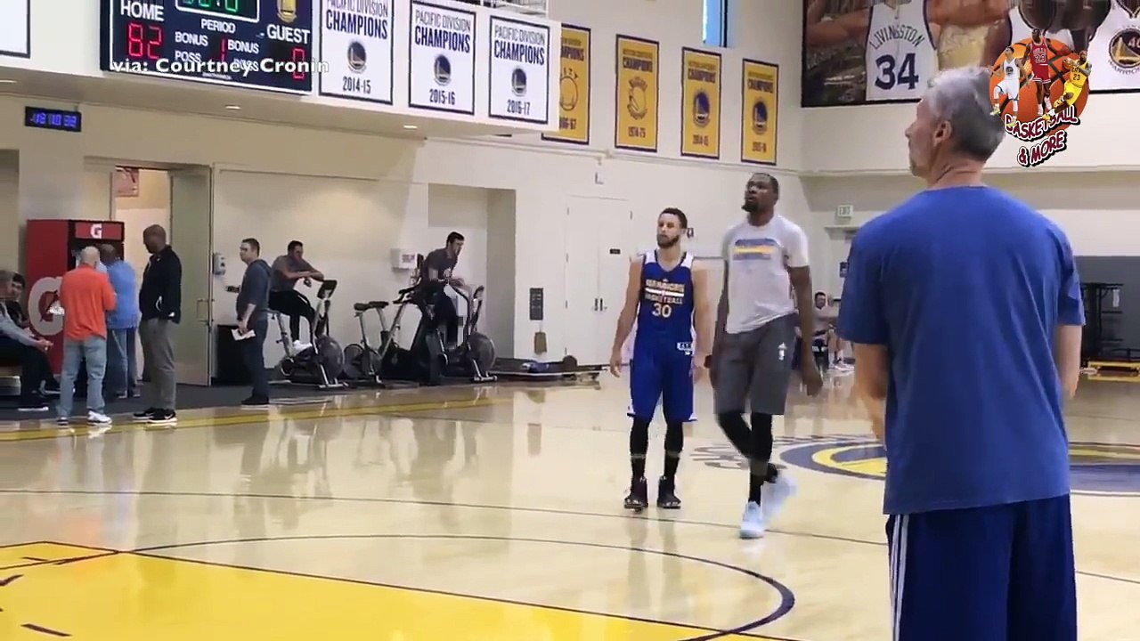 Stephen Curry & Kevin Durant work on their shot while Zaza Pachulia rides hard on an exercise bike